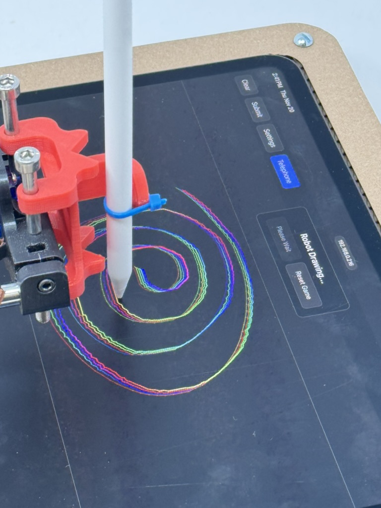 Close-up of the Apple Pencil end effector drawing a spiral on an iPad